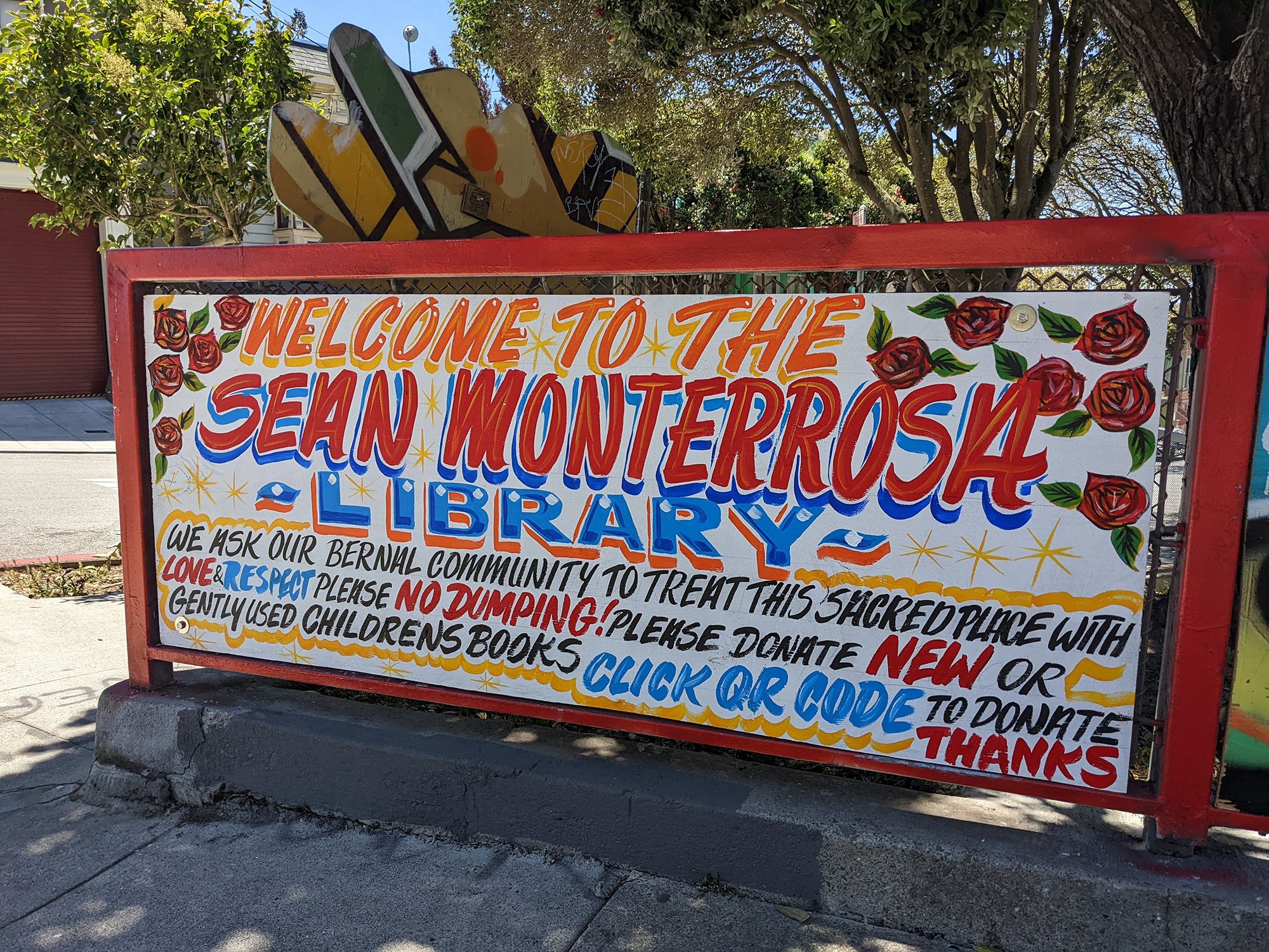 A sign for the Sean Monterrosa Library outside Junipero Serra Elementary School in San Francisco.