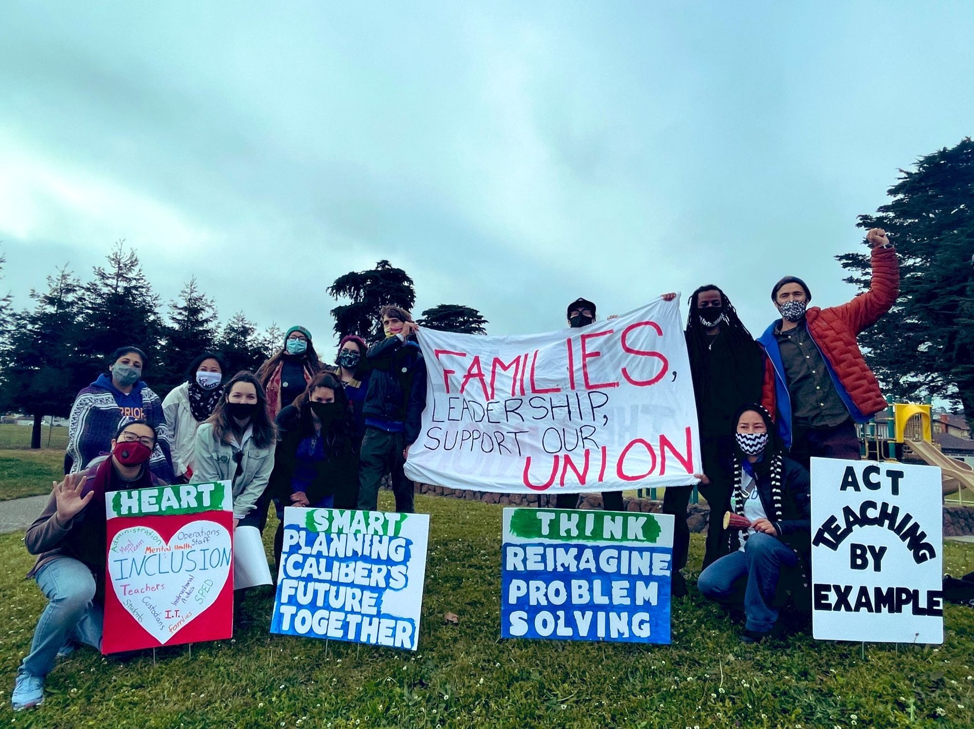 Employees and supporters at Caliber: Beta Academy during a union rally in April 2021.