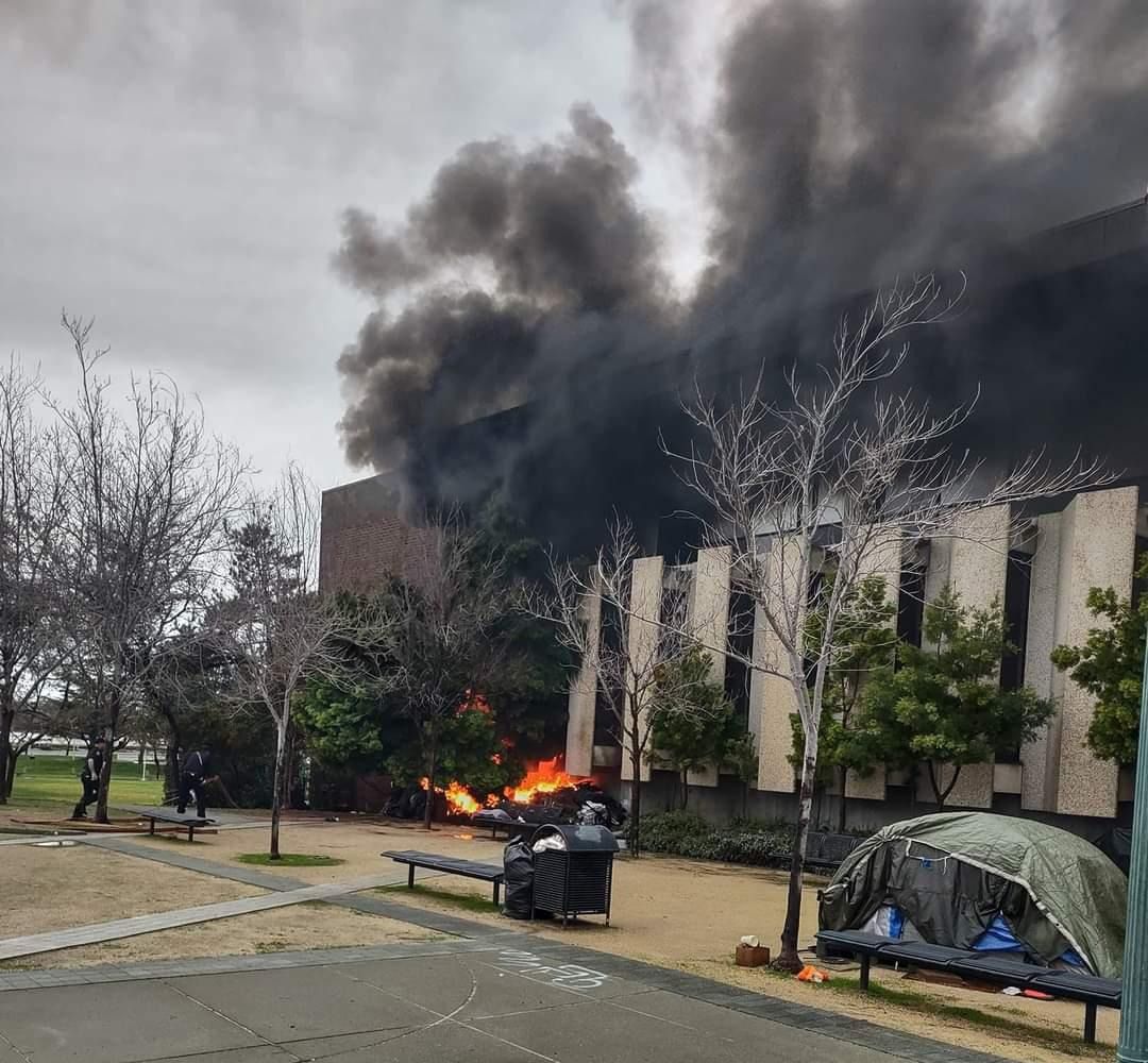 A tent caught fire outside the JFK library