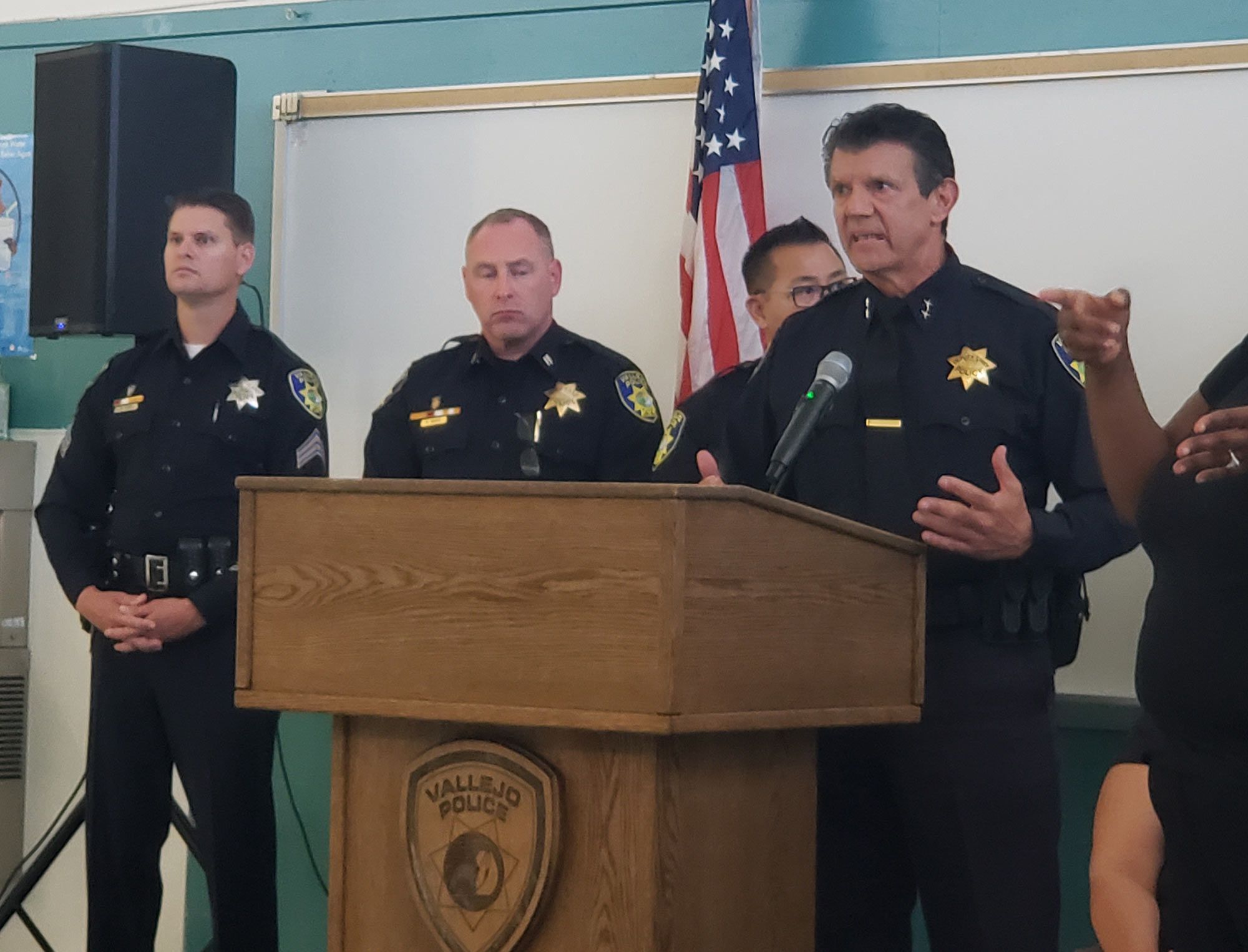 Vallejo Deputy Police Chief Joe Gomez narrates video of a June 27 police shooting at a town hall meeting on Wednesday afternoon. Photo: Ryan Geller.