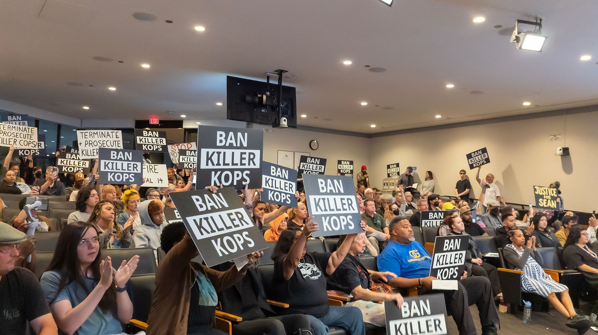 Protestors packed Vallejo City Hall on Tuesday to demand action against the rehiring of Det. Jarrett Tonn