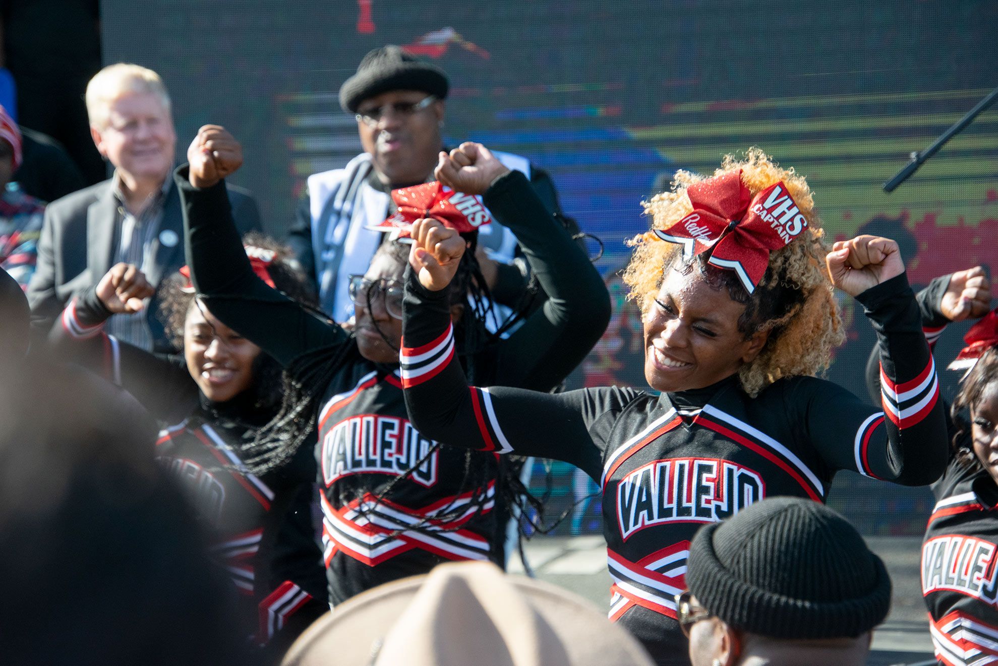 Vallejo Mayor Robert McConnell and rapper E-40 during a presentation by the Vallejo High School cheerleading squad. 