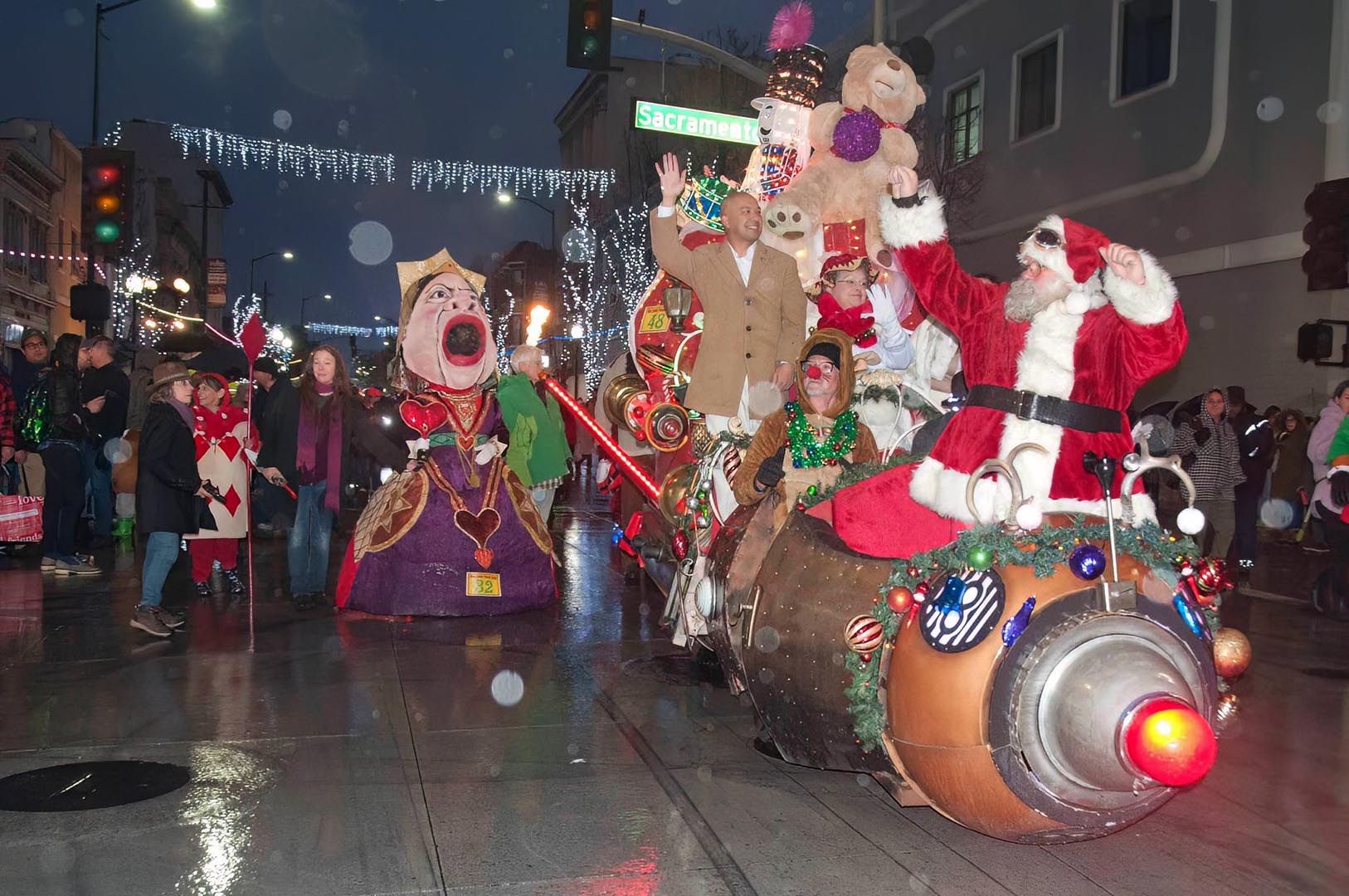 Thomas Bilbo pilots Santa's Sleigh in the Mad Hatter 2022 parade.