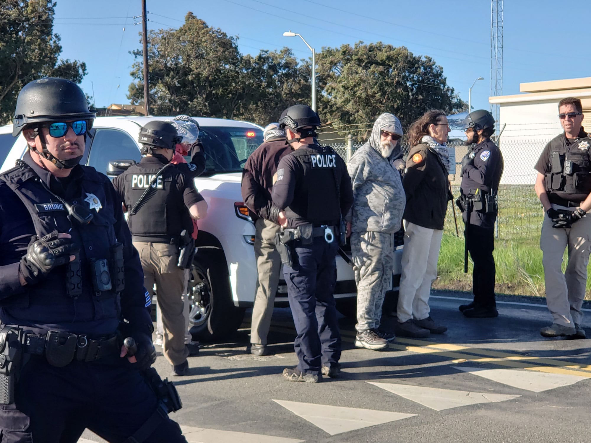 ive people were arrested for blocking the street leading to Travis Air Force Base 
