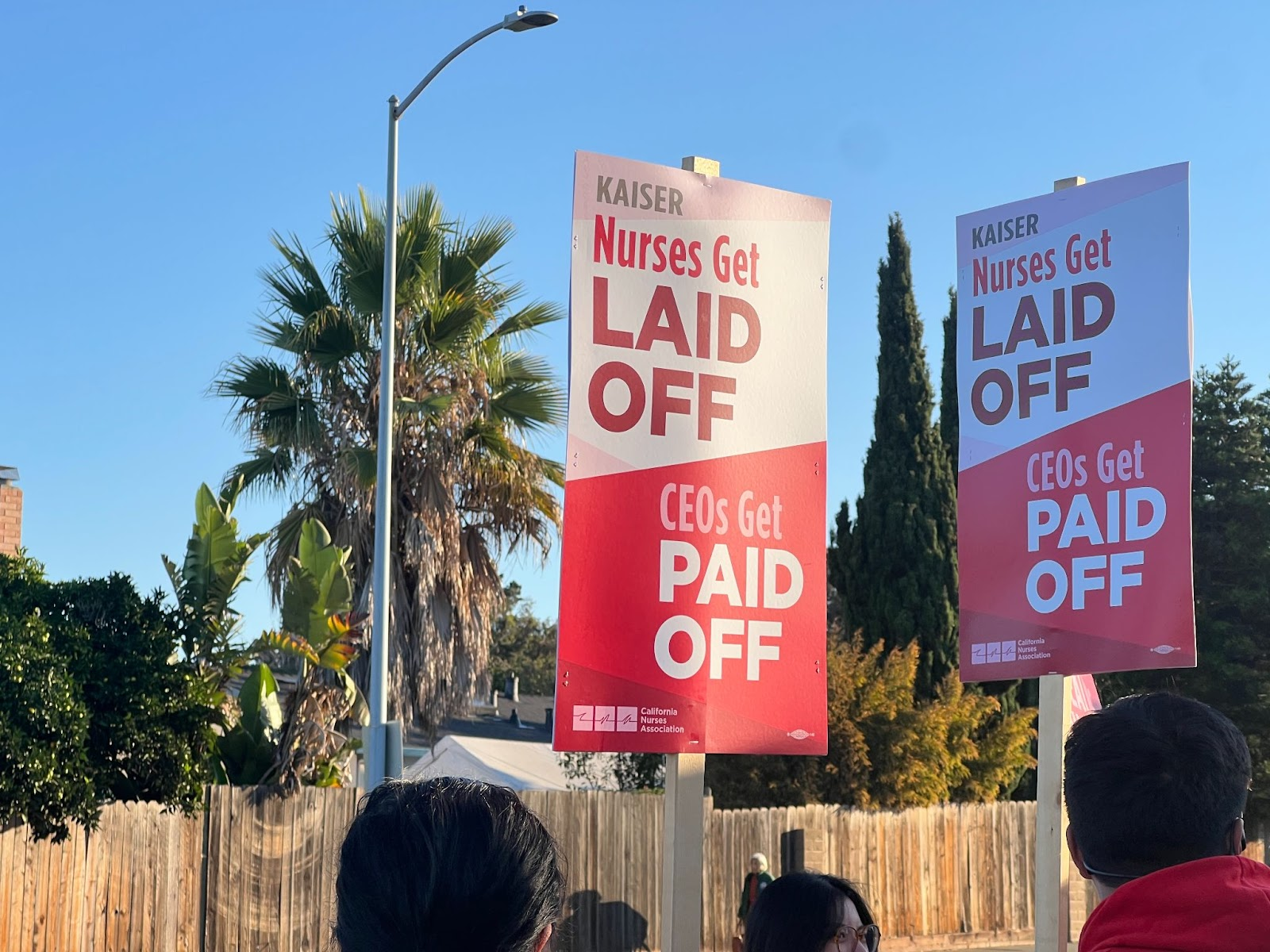 Nurses holding signs outside the Kaiser Permanente facility in Vallejo.