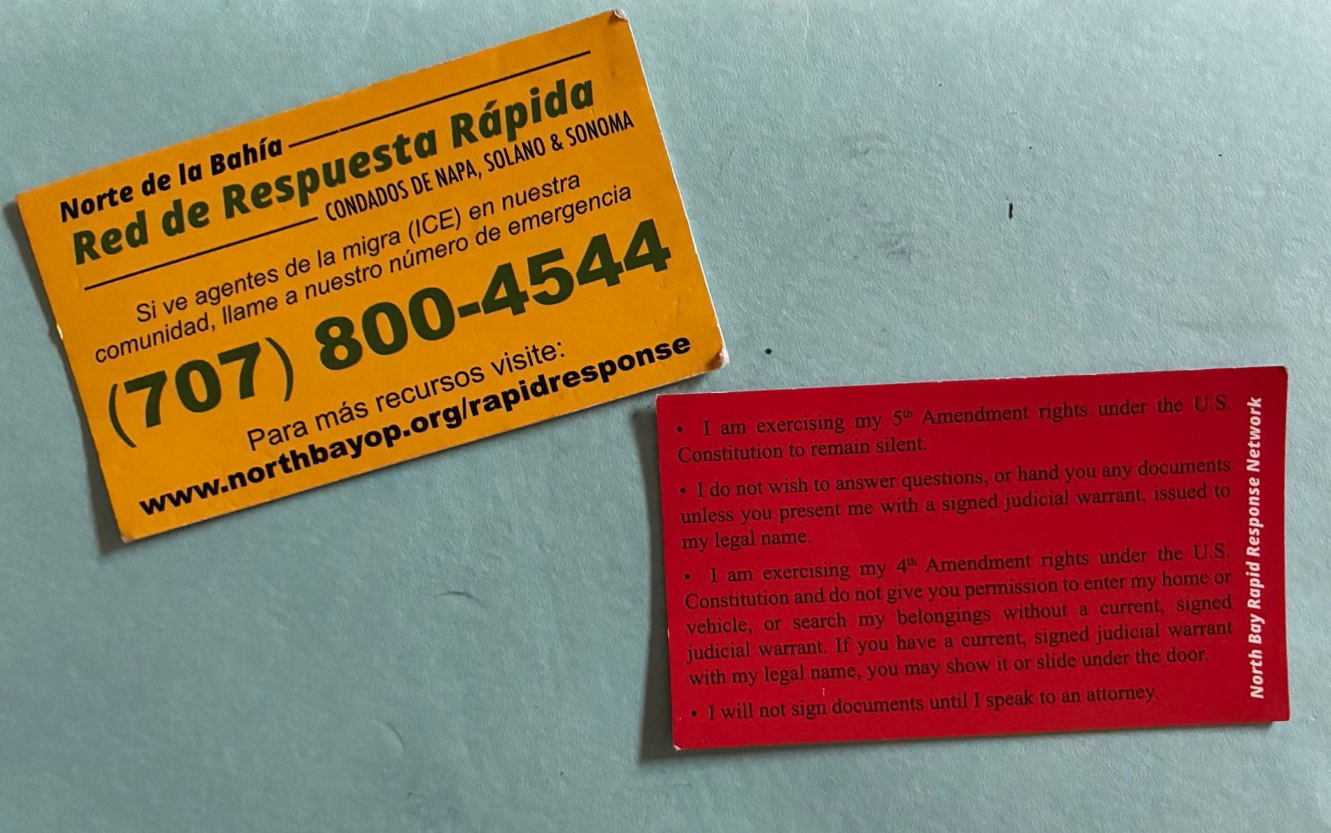 The North Bay Rapid Response business card informs people of their rights in case of immigration enforcement.
