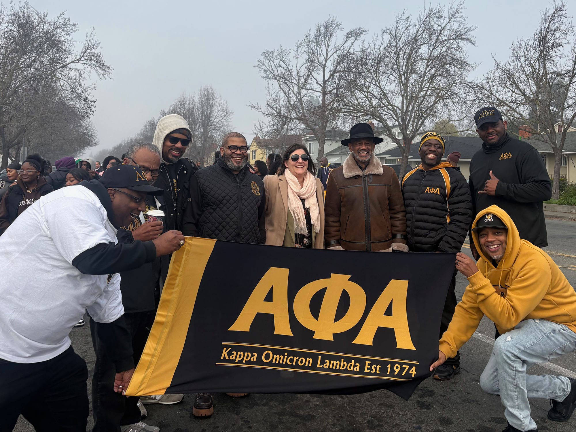 Members of the Kappa Omicron Lambda fraternity are joined by Vallejo Mayor Andrea Sorce 