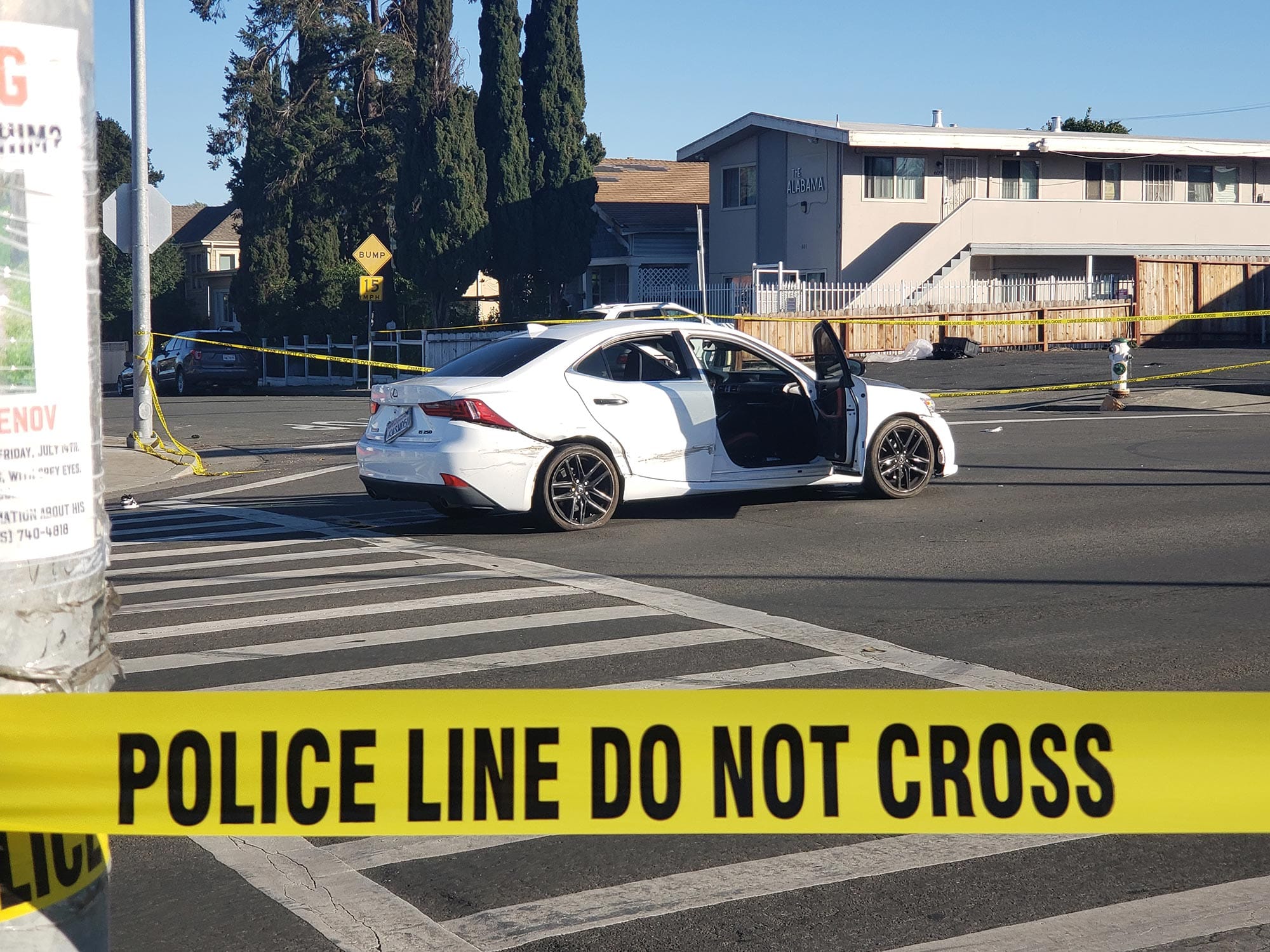 A white Lexus was abandoned by two fleeing suspects in November. Photo: Ryan Geller.