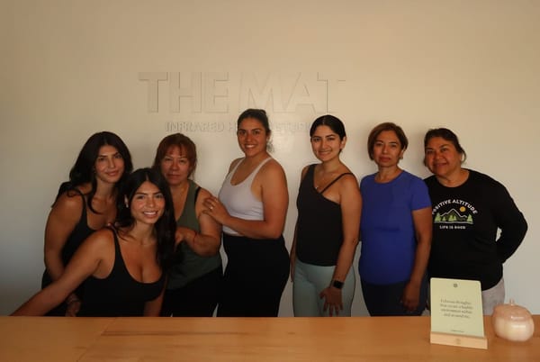 From left to right: Crystal Reynoso, Joselyn Reynoso, Josefina Reynoso, Berenice Preciado, and students attending Spanish yoga class